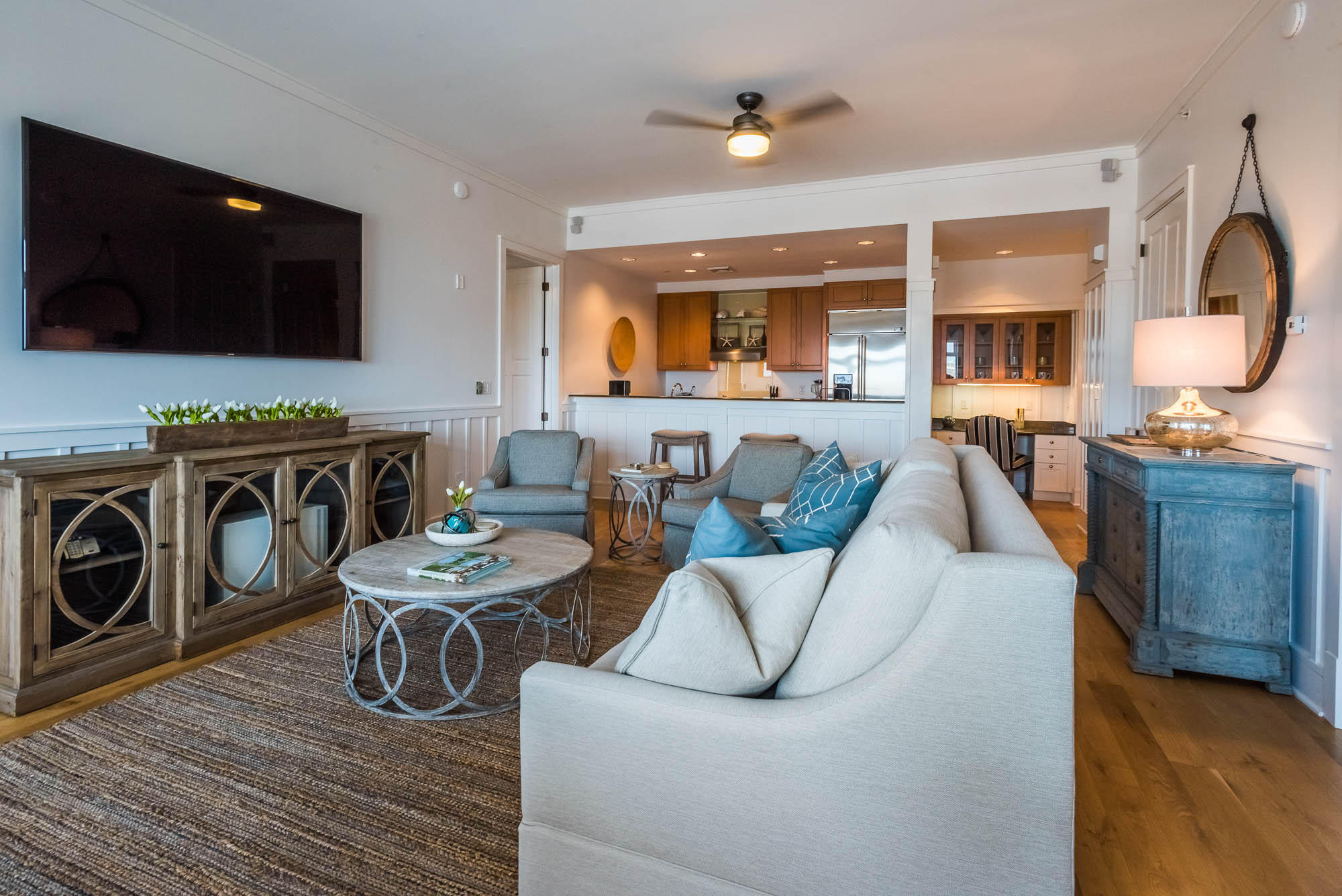 99 Compass Point Way South, Unit 304 Inlet Beach, FL 32461 - Photo 9 of 32 a living room with furniture a flat screen tv and kitchen view