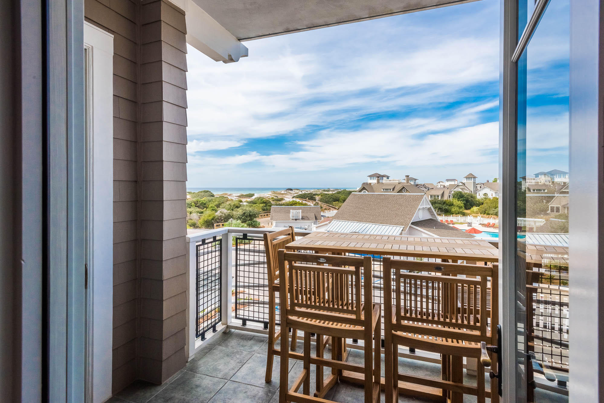 99 Compass Point Way South, Unit 304 Inlet Beach, FL 32461 - Photo 10 of 32 a view of a balcony with furniture