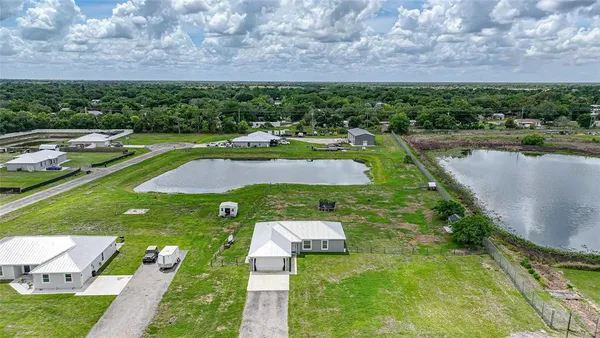 a view of a lake with a building in the background