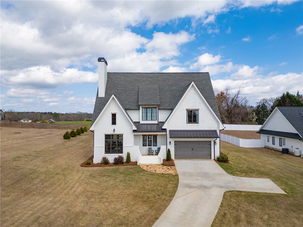 677 Lightwood Road Hartwell, GA 30643 - Photo 1 of 42 This charming residence offers a spacious and welcoming curb appeal with a well-maintained exterior.