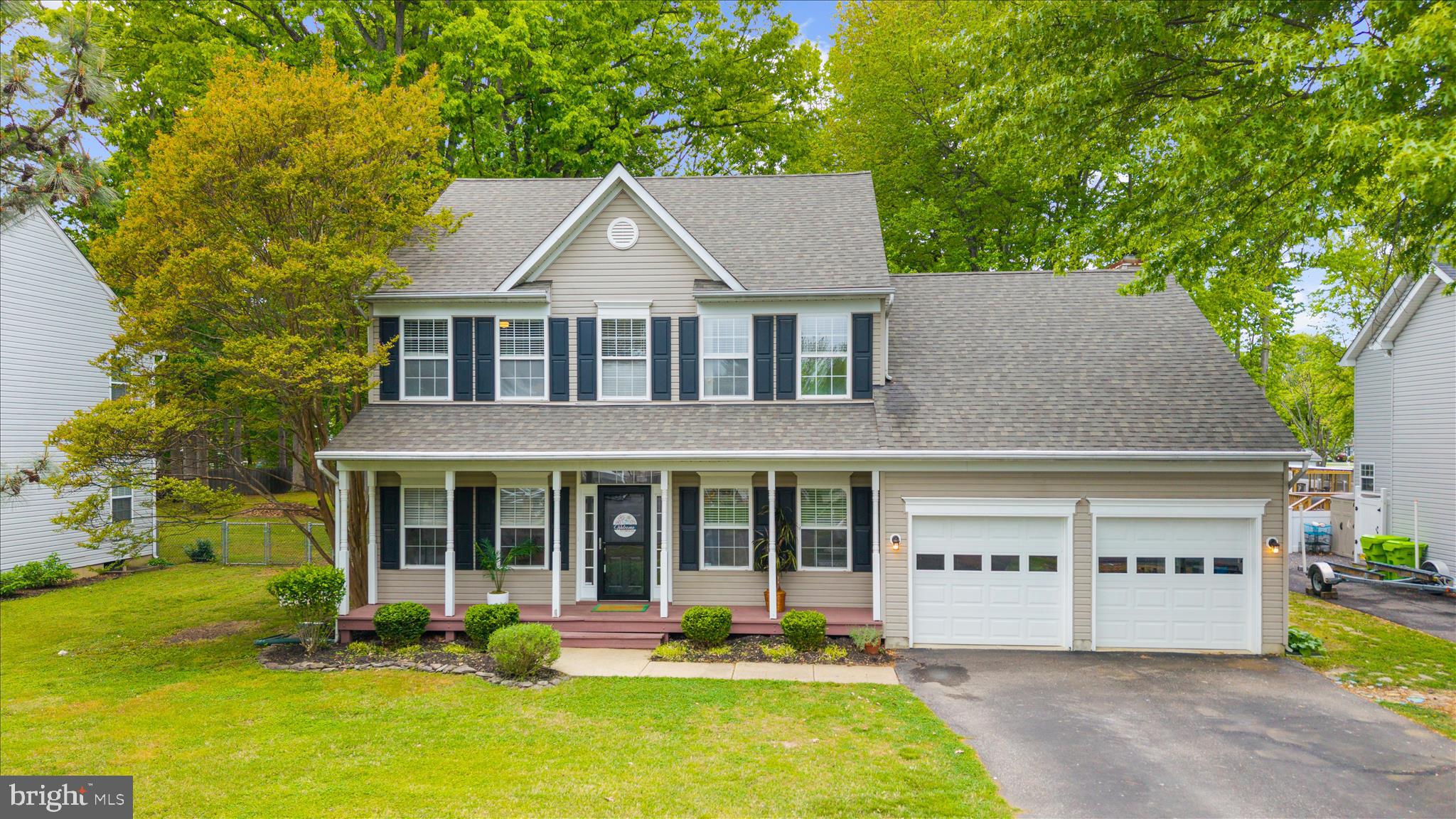 705 Davol Road Stevensville, MD 21666 - Photo 2 of 63 Front porch and 2 car garage