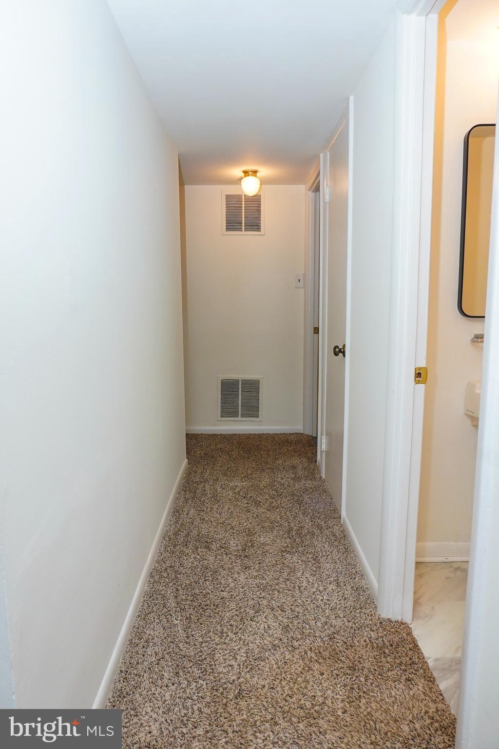 7019 Redmiles Road Laurel, MD 20707 - Photo 46 of 59 Basement Hall View