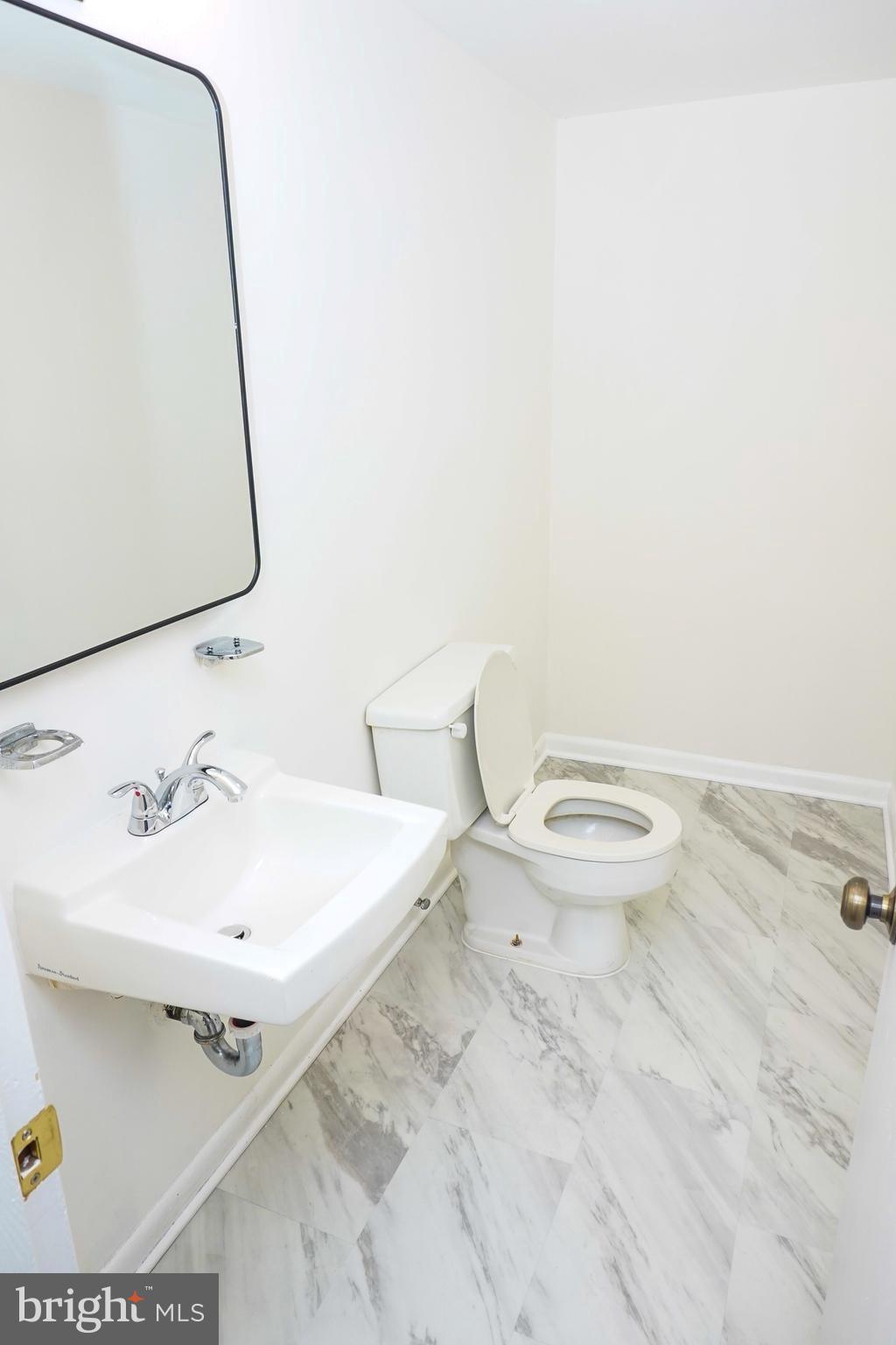 7019 Redmiles Road Laurel, MD 20707 - Photo 47 of 59 Basement Half Bath 1
