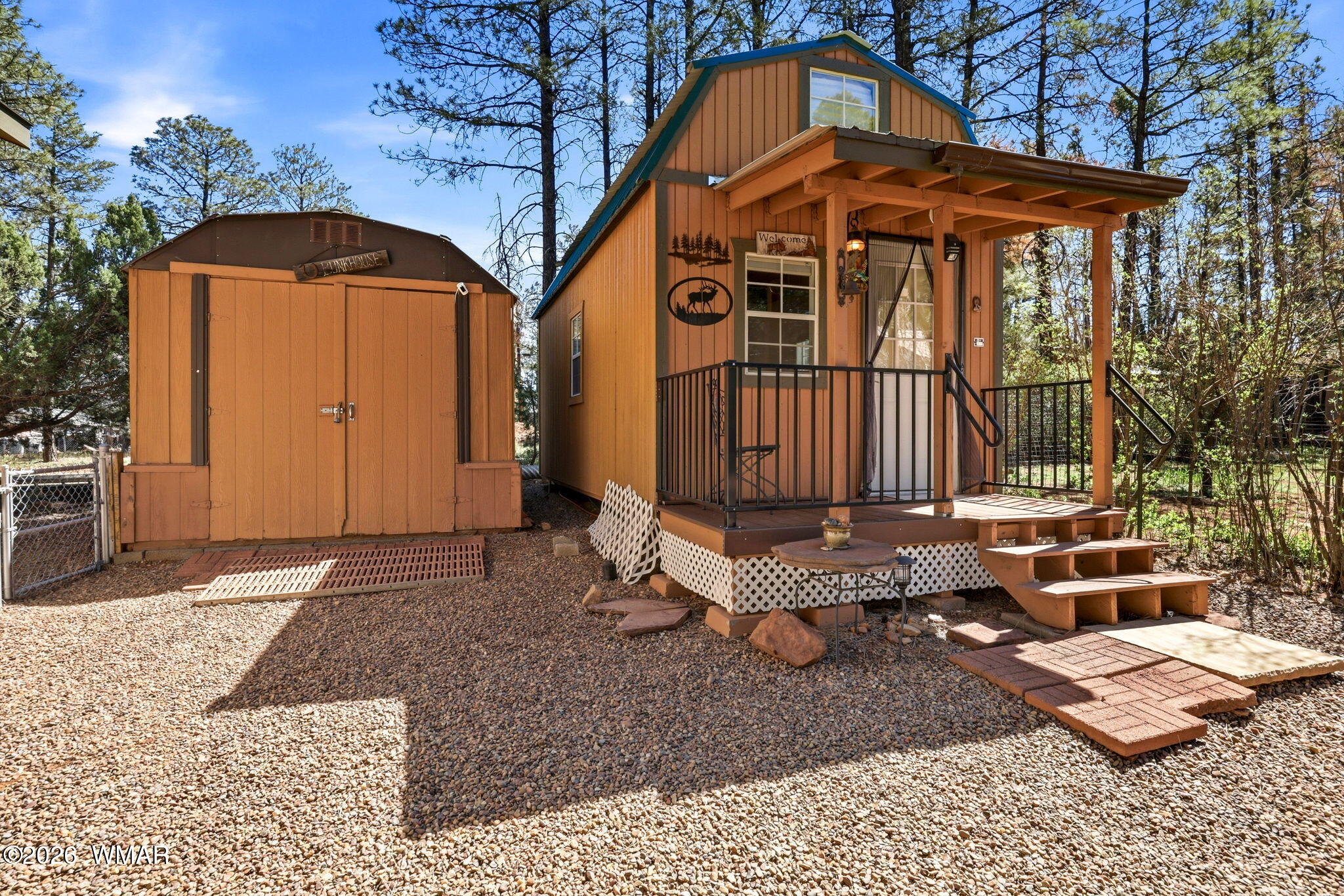2893 Tracy Road Overgaard, AZ 85933 - Photo 17 of 26 a front view of a house