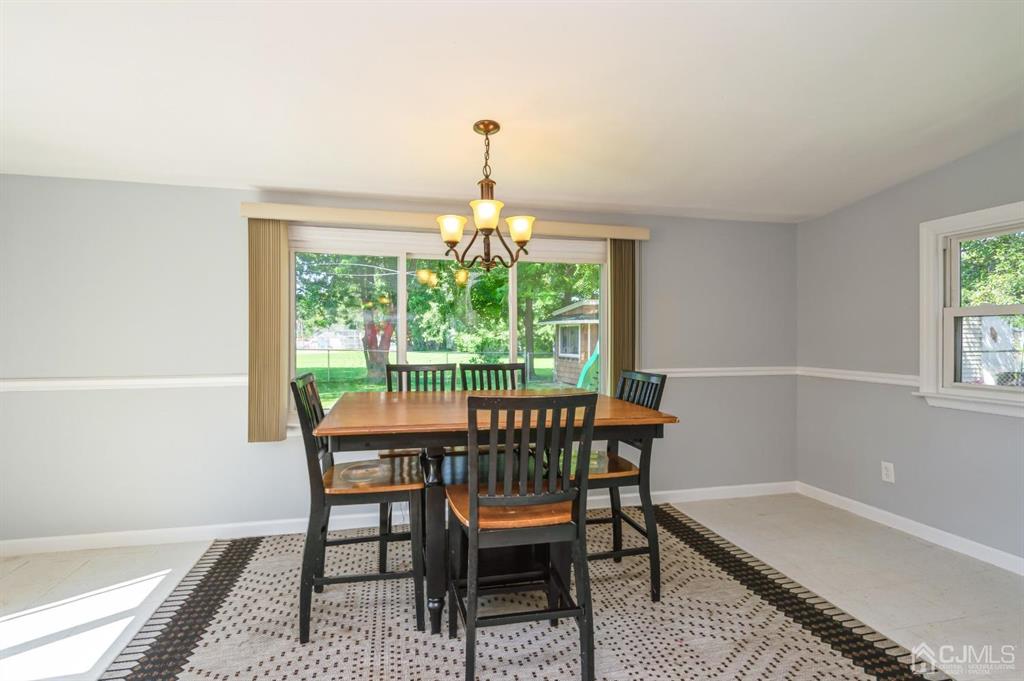 24 Markham Road Edison, NJ 08817 - Photo 8 of 20 a dining room with furniture and window