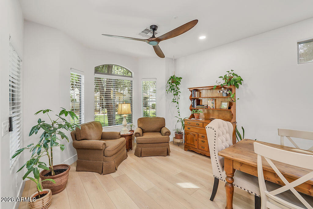 3116 East Tamarisk Street Gilbert, AZ 85296 - Photo 12 of 35 a living room with furniture and a large window