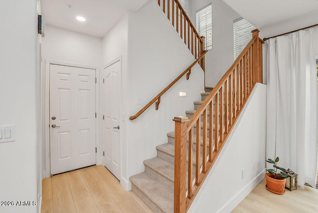 3116 East Tamarisk Street Gilbert, AZ 85296 - Photo 20 of 35 a view of entryway and hall with wooden floor