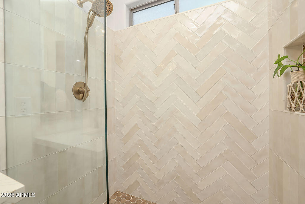 3116 East Tamarisk Street Gilbert, AZ 85296 - Photo 23 of 35 a bathroom with a shower