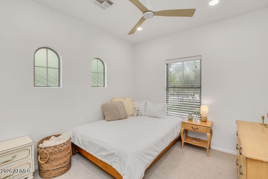 3116 East Tamarisk Street Gilbert, AZ 85296 - Photo 27 of 35 a bedroom with a bed and a dresser