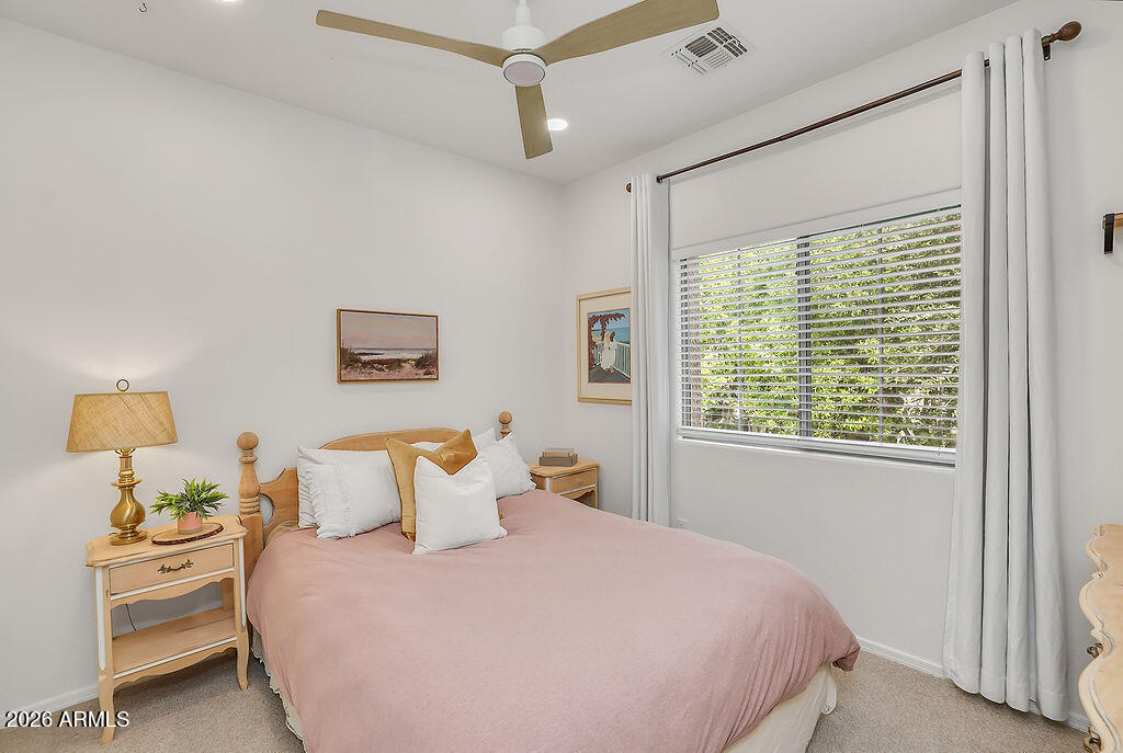 3116 East Tamarisk Street Gilbert, AZ 85296 - Photo 28 of 35 a bedroom with a bed and a window
