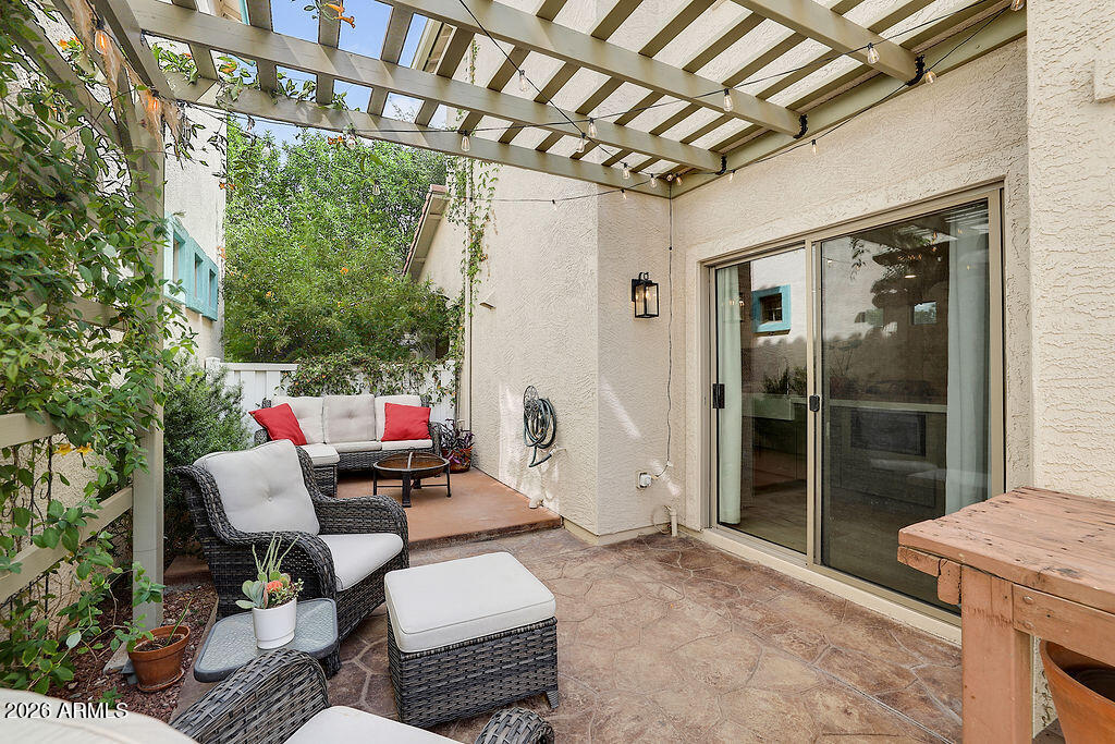 3116 East Tamarisk Street Gilbert, AZ 85296 - Photo 34 of 35 a house view with a sitting space and garden