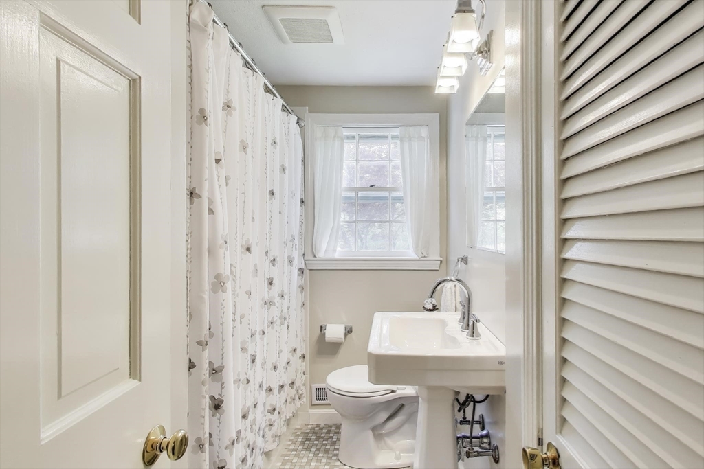 24 Spruce Drive Westwood, MA 02090 - Photo 11 of 32 a bathroom with a sink toilet and shower