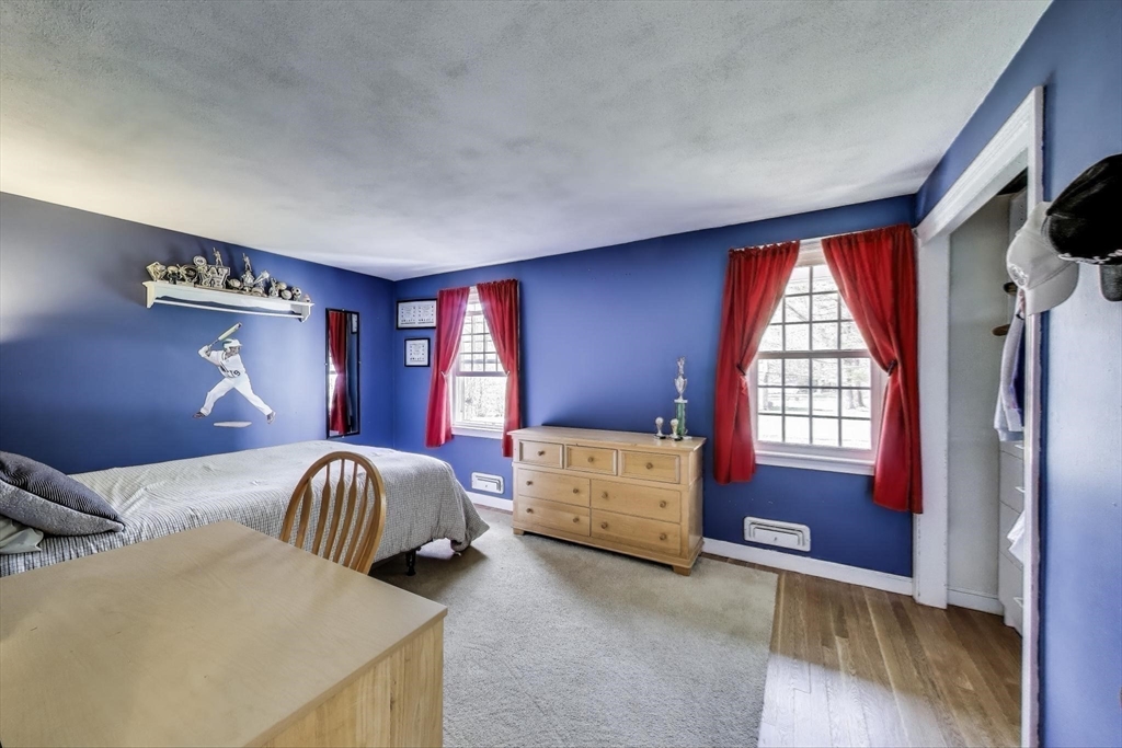 24 Spruce Drive Westwood, MA 02090 - Photo 20 of 32 a bedroom with two beds and a window