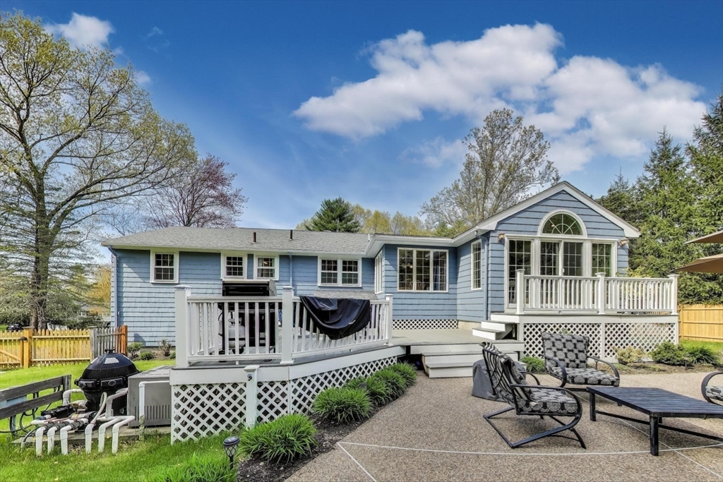 24 Spruce Drive Westwood, MA 02090 - Photo 28 of 32 a front view of a house with patio
