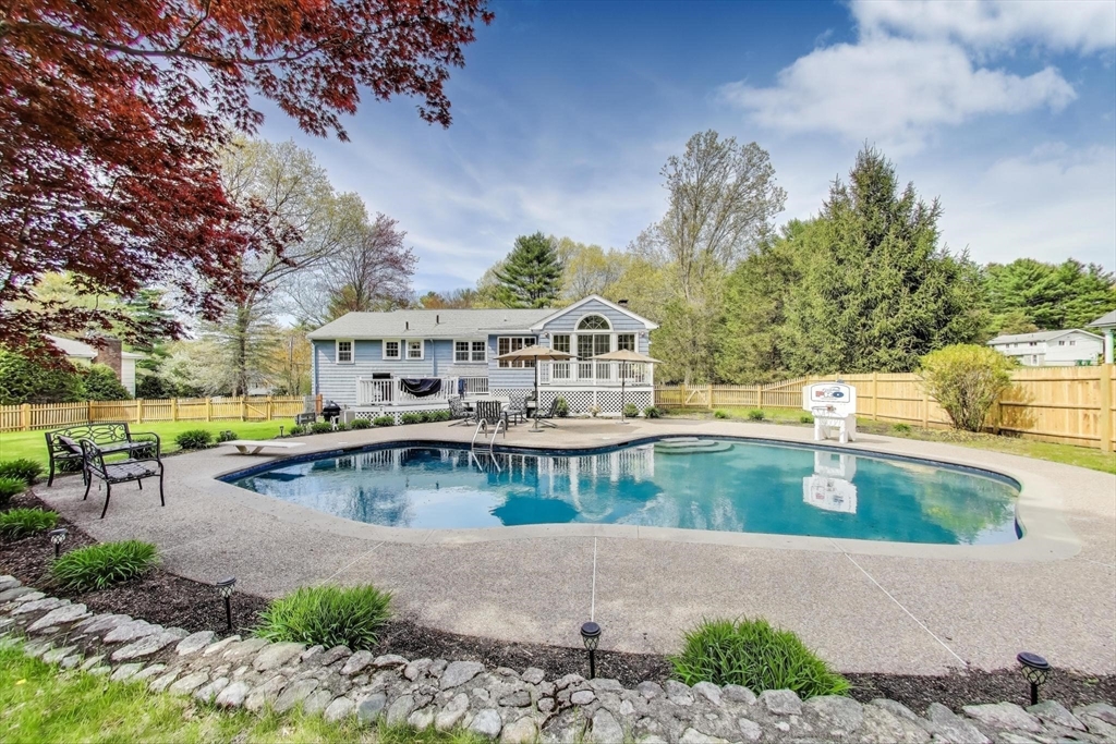 24 Spruce Drive Westwood, MA 02090 - Photo 29 of 32 a view of a swimming pool with a patio and a yard