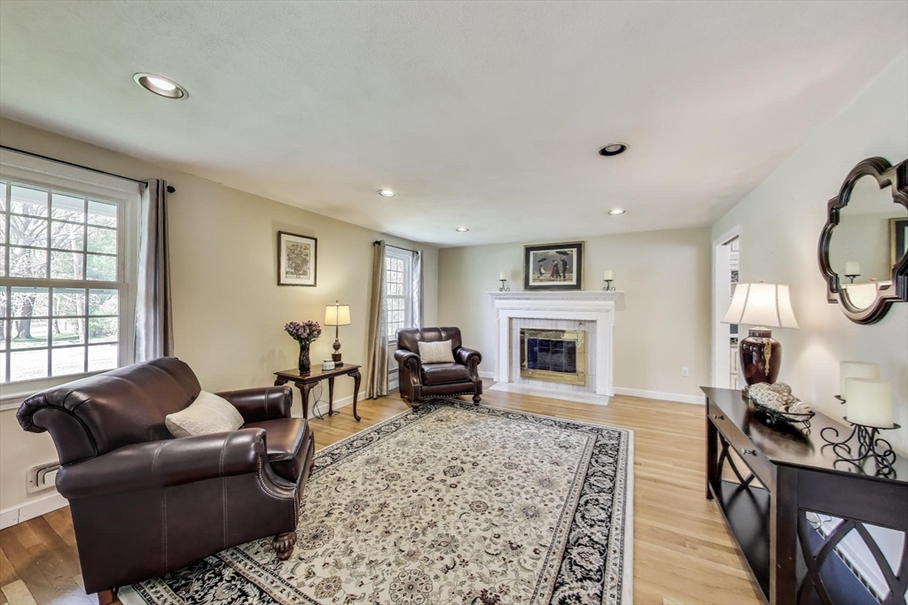 24 Spruce Drive Westwood, MA 02090 - Photo 3 of 32 a living room with furniture or couch and a fireplace