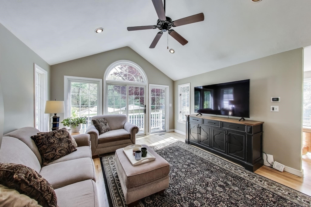 24 Spruce Drive Westwood, MA 02090 - Photo 9 of 32 a living room with furniture and a flat screen tv