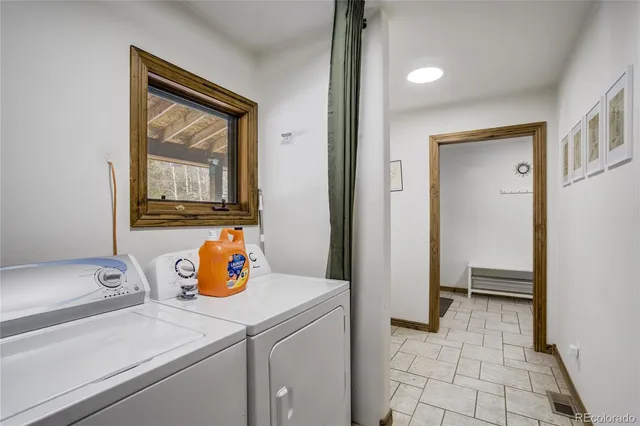 a view of a swimming pool with a sitting area