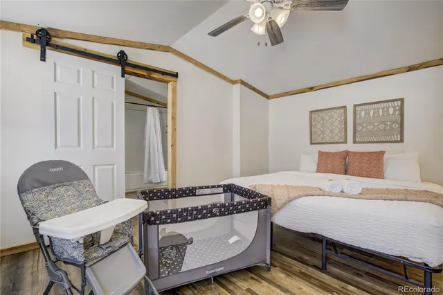 a view of a bathroom with sink and mirror