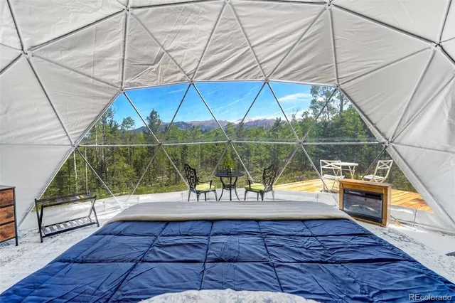 a view of a balcony with chairs
