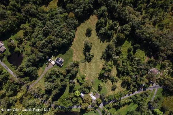 a view of a house with a tree