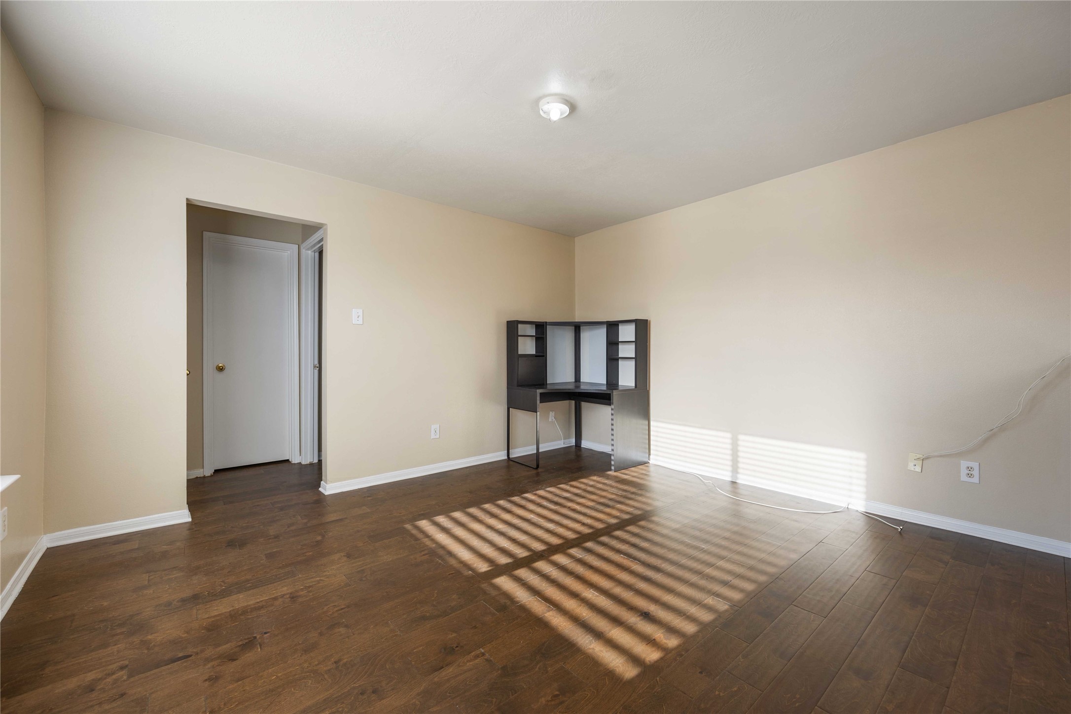 4806 Cotton Ridge Trail Houston, TX 77053 - Photo 15 of 25 wooden floor in an empty room with a window