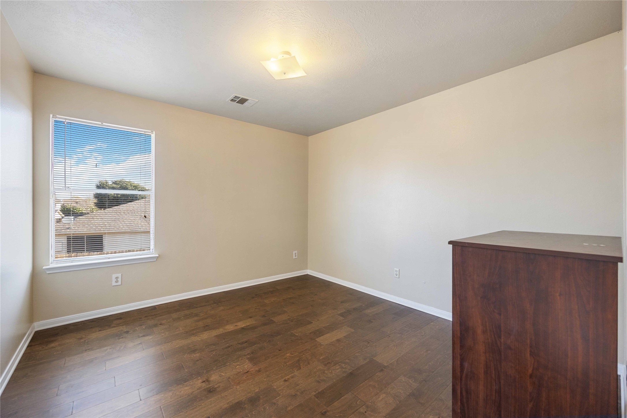 4806 Cotton Ridge Trail Houston, TX 77053 - Photo 18 of 25 an empty room with a window