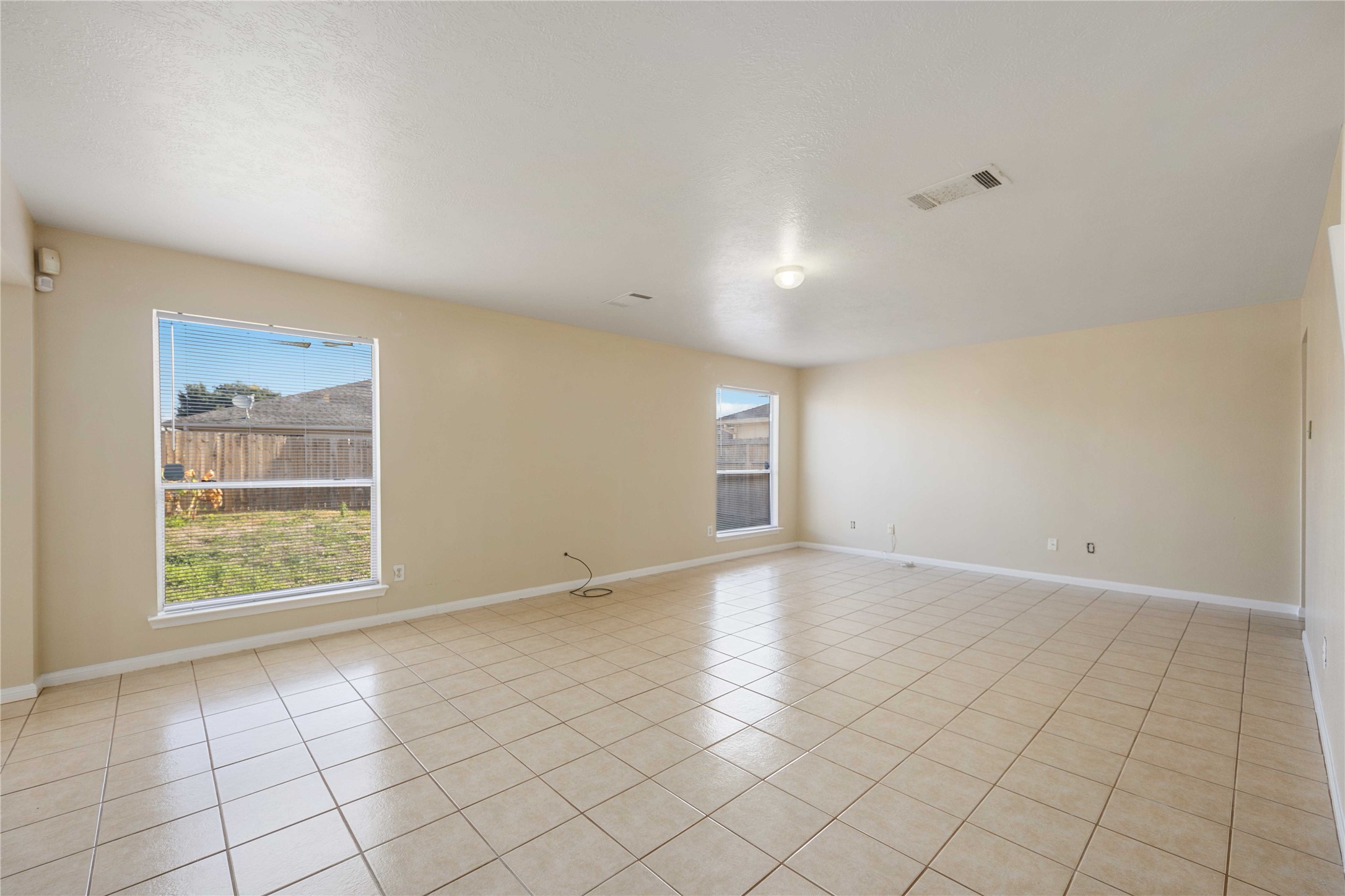 4806 Cotton Ridge Trail Houston, TX 77053 - Photo 2 of 25 an empty room with windows