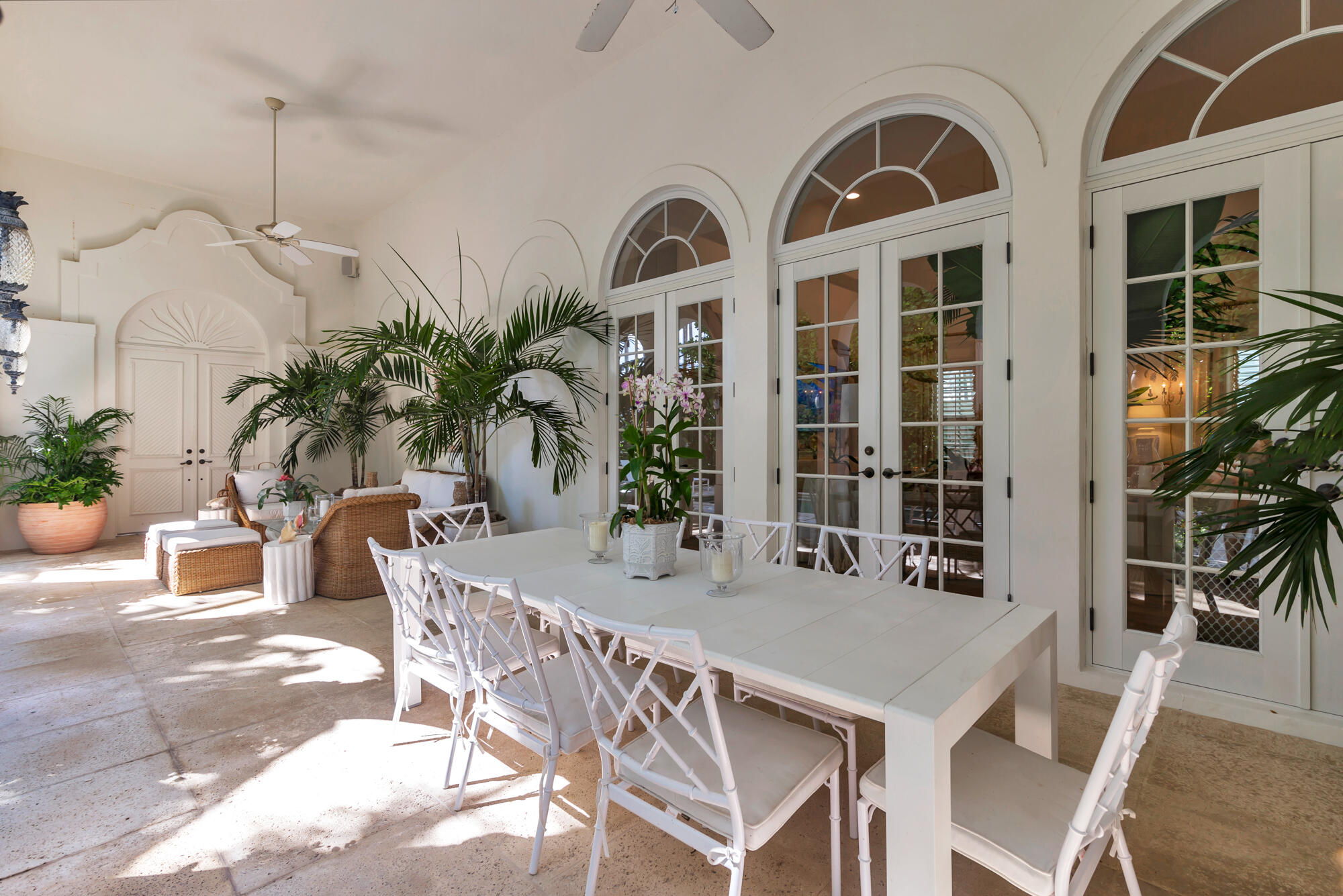 119 Alpine Road West Palm Beach, FL 33405 - Photo 23 of 30 a view of a dinning table and chairs in the patio