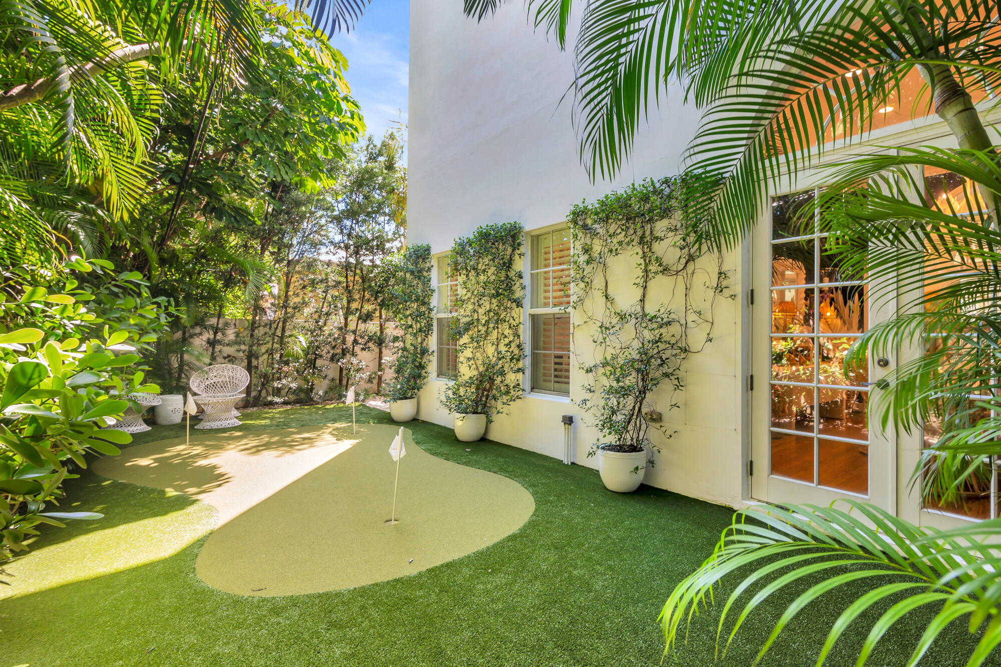 119 Alpine Road West Palm Beach, FL 33405 - Photo 26 of 30 a view of a swimming pool with a patio