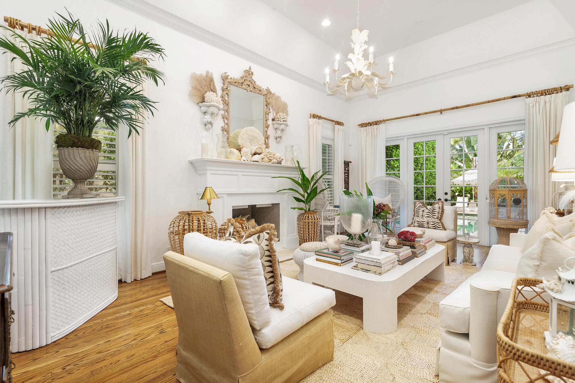 119 Alpine Road West Palm Beach, FL 33405 - Photo 10 of 30 a living room with furniture a chandelier and a large window
