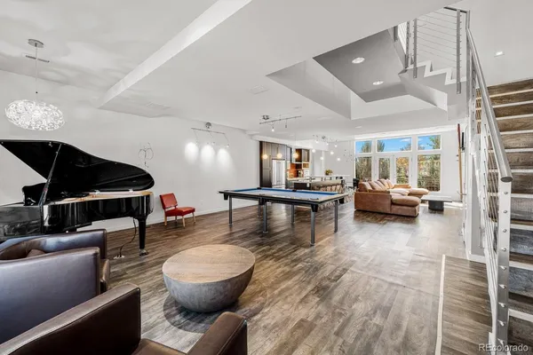 a living room with furniture and a view of living room