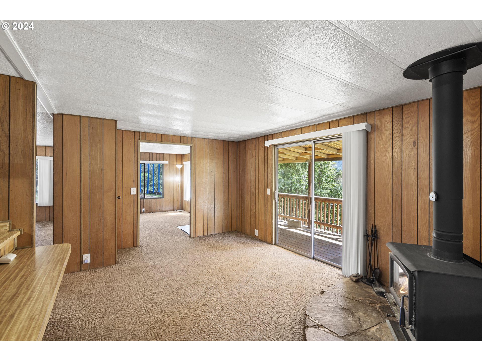 10244 North Applegate Road Grants Pass, OR 97527 - Photo 7 of 24 a view of a room with large windows