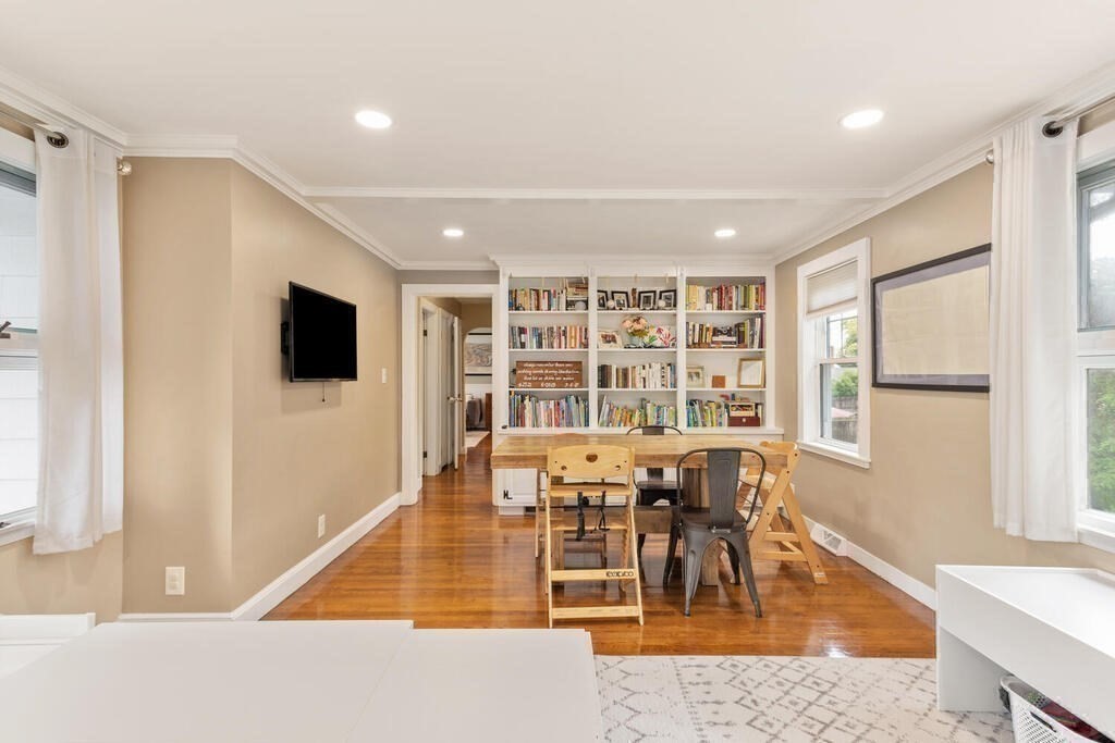116 Quinn Road Lynn, MA 01904 - Photo 12 of 27 a living room with furniture wooden floor and a flat screen tv