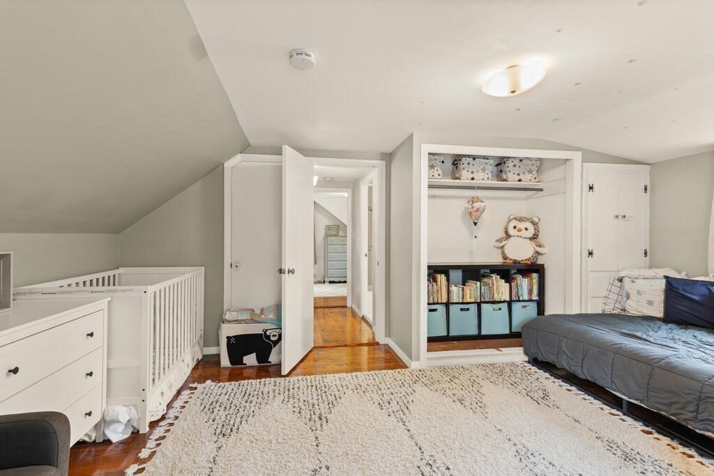 116 Quinn Road Lynn, MA 01904 - Photo 17 of 27 a bedroom with a bed and a dresser