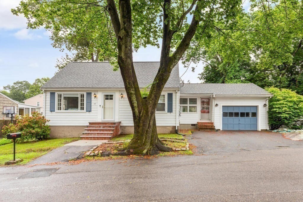 116 Quinn Road Lynn, MA 01904 - Photo 2 of 27 a front view of a house with a garden and tree