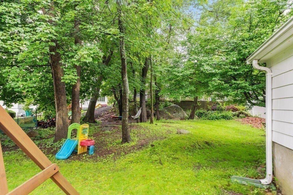 116 Quinn Road Lynn, MA 01904 - Photo 23 of 27 a view of a backyard with swimming pool