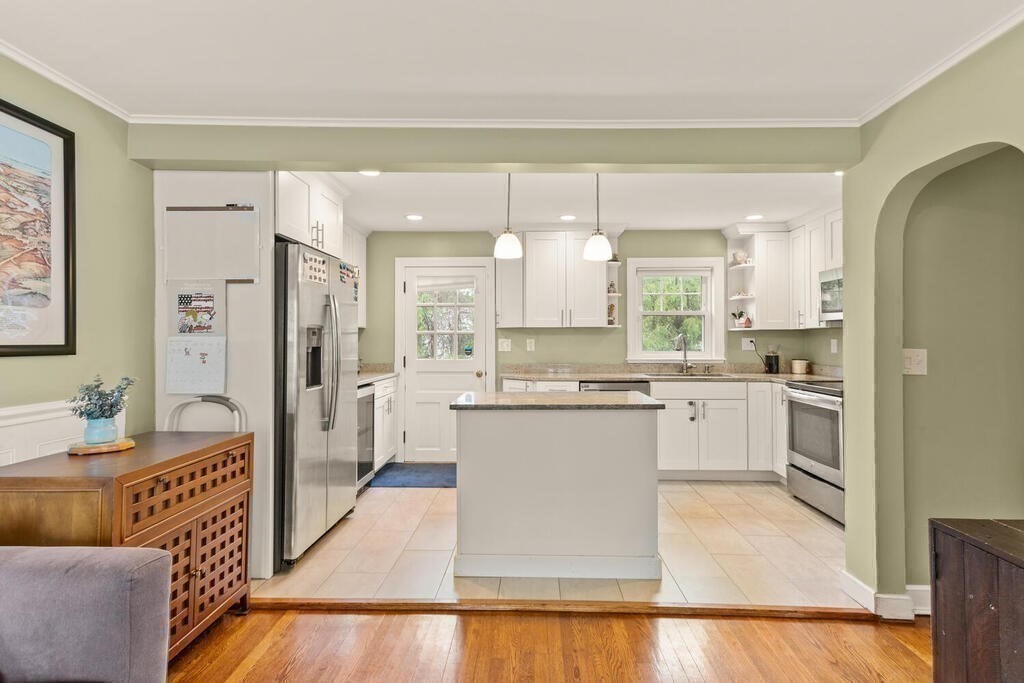 116 Quinn Road Lynn, MA 01904 - Photo 8 of 27 a kitchen with a refrigerator and a sink