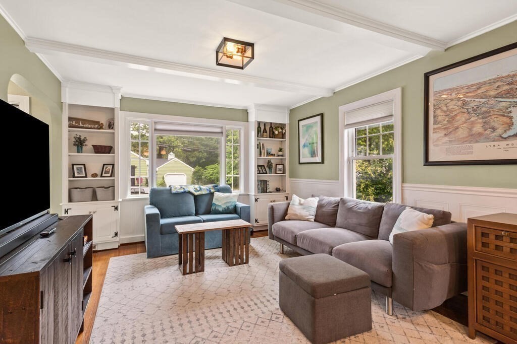 116 Quinn Road Lynn, MA 01904 - Photo 9 of 27 a living room with furniture and a flat screen tv