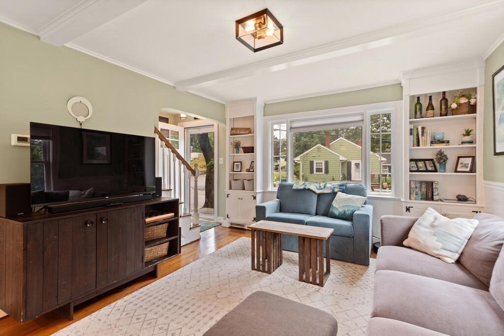 116 Quinn Road Lynn, MA 01904 - Photo 10 of 27 a living room with furniture and a flat screen tv