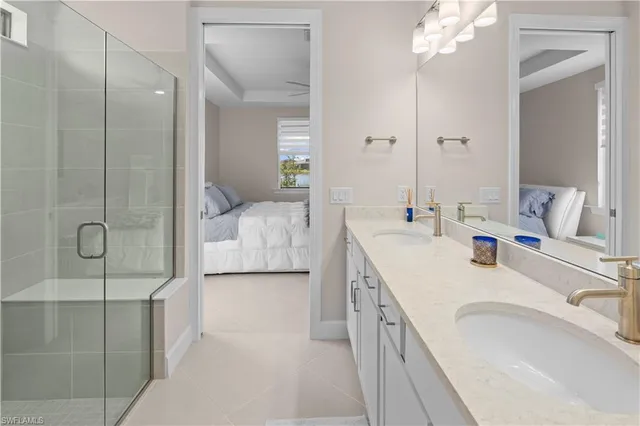 a view of walk in closet with clothes