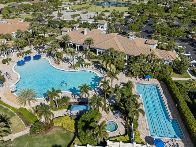 a view of a swimming pool and an ocean view