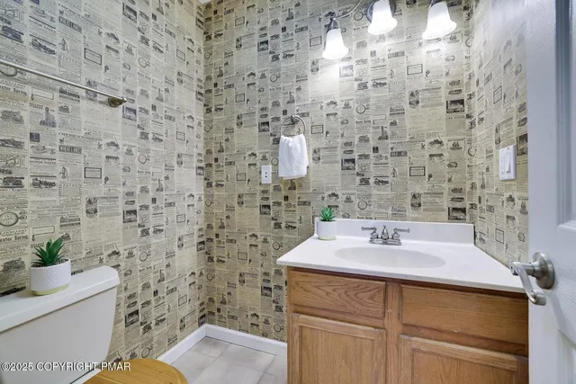 a bathroom with a sink and a toilet