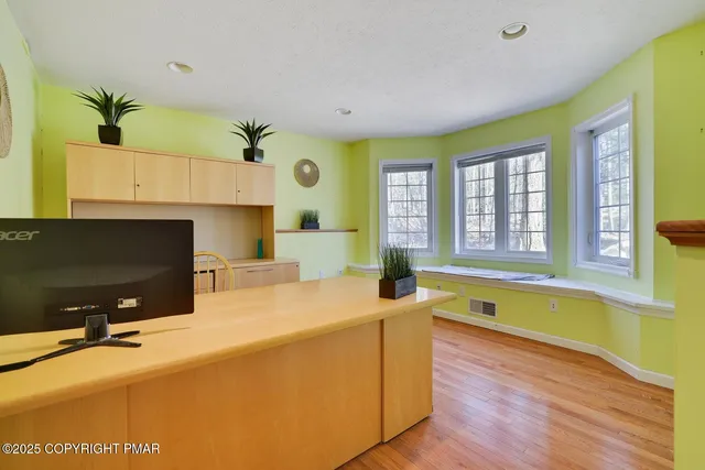 a living room with furniture and a pool