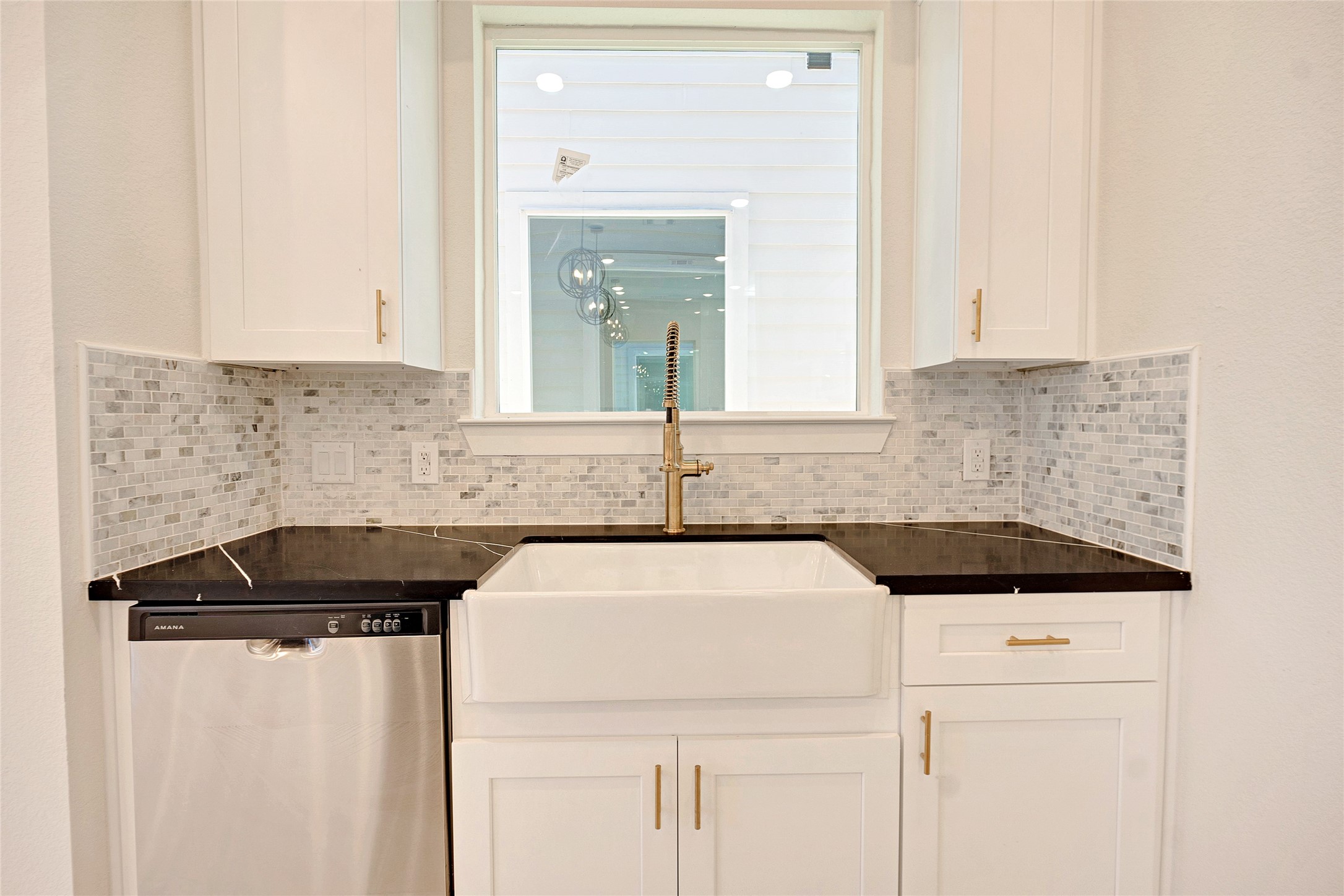 5908 St Augustine Street, Unit C Houston, TX 77021 - Photo 24 of 33 a kitchen with a sink and cabinets