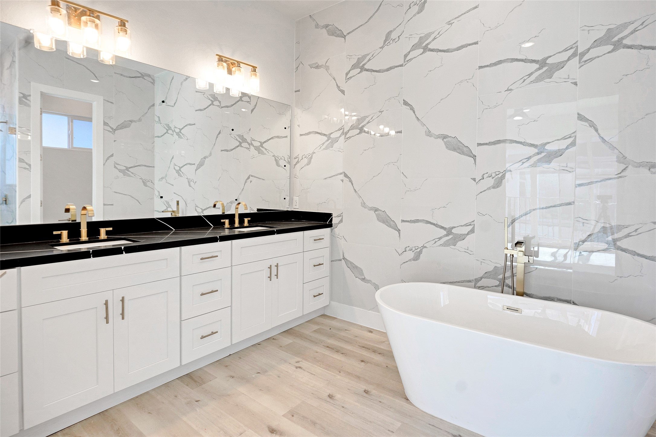 5908 St Augustine Street, Unit C Houston, TX 77021 - Photo 26 of 33 a bathroom with a bathtub and sink