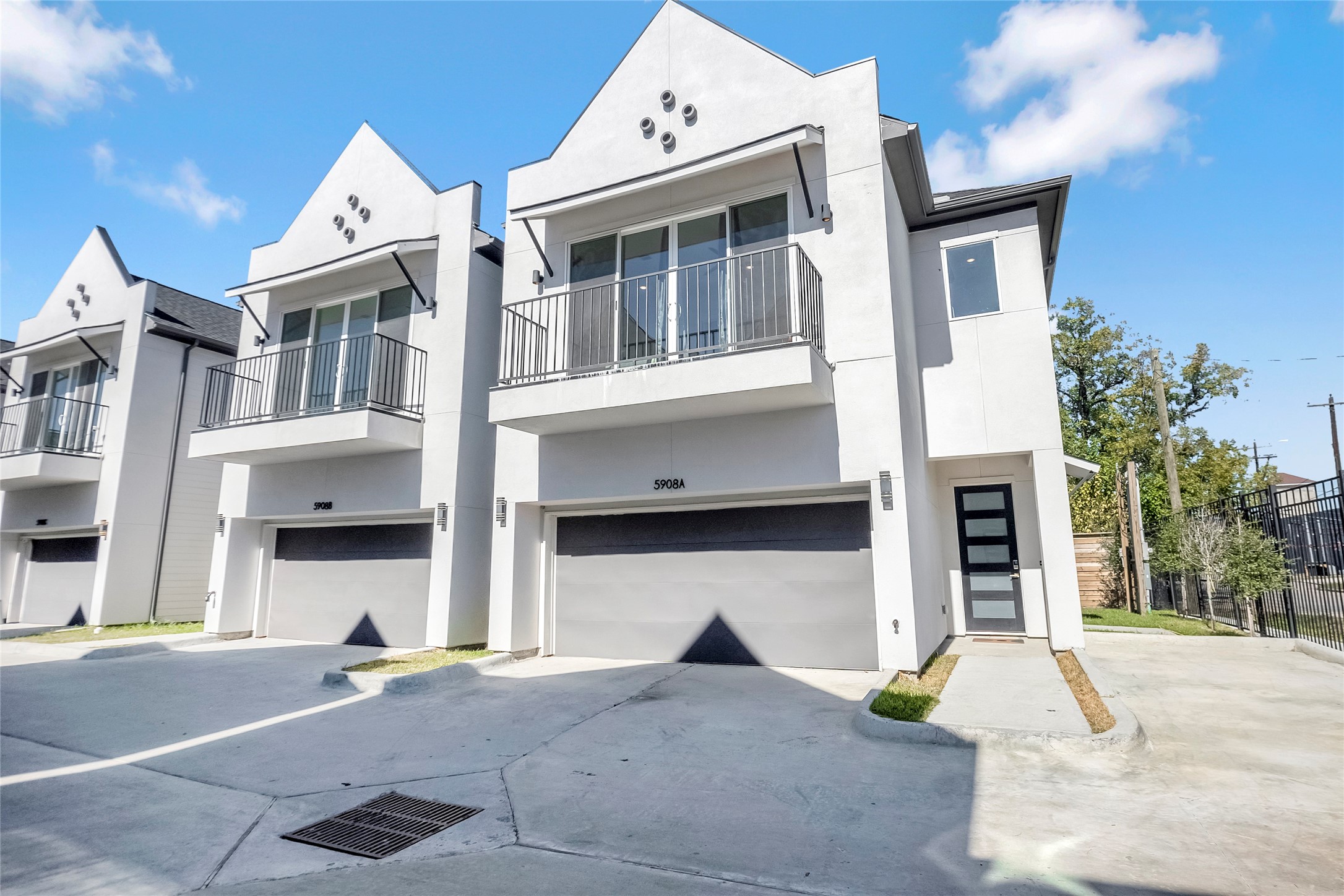 5908 St Augustine Street, Unit C Houston, TX 77021 - Photo 32 of 33 a front view of a building with a garage