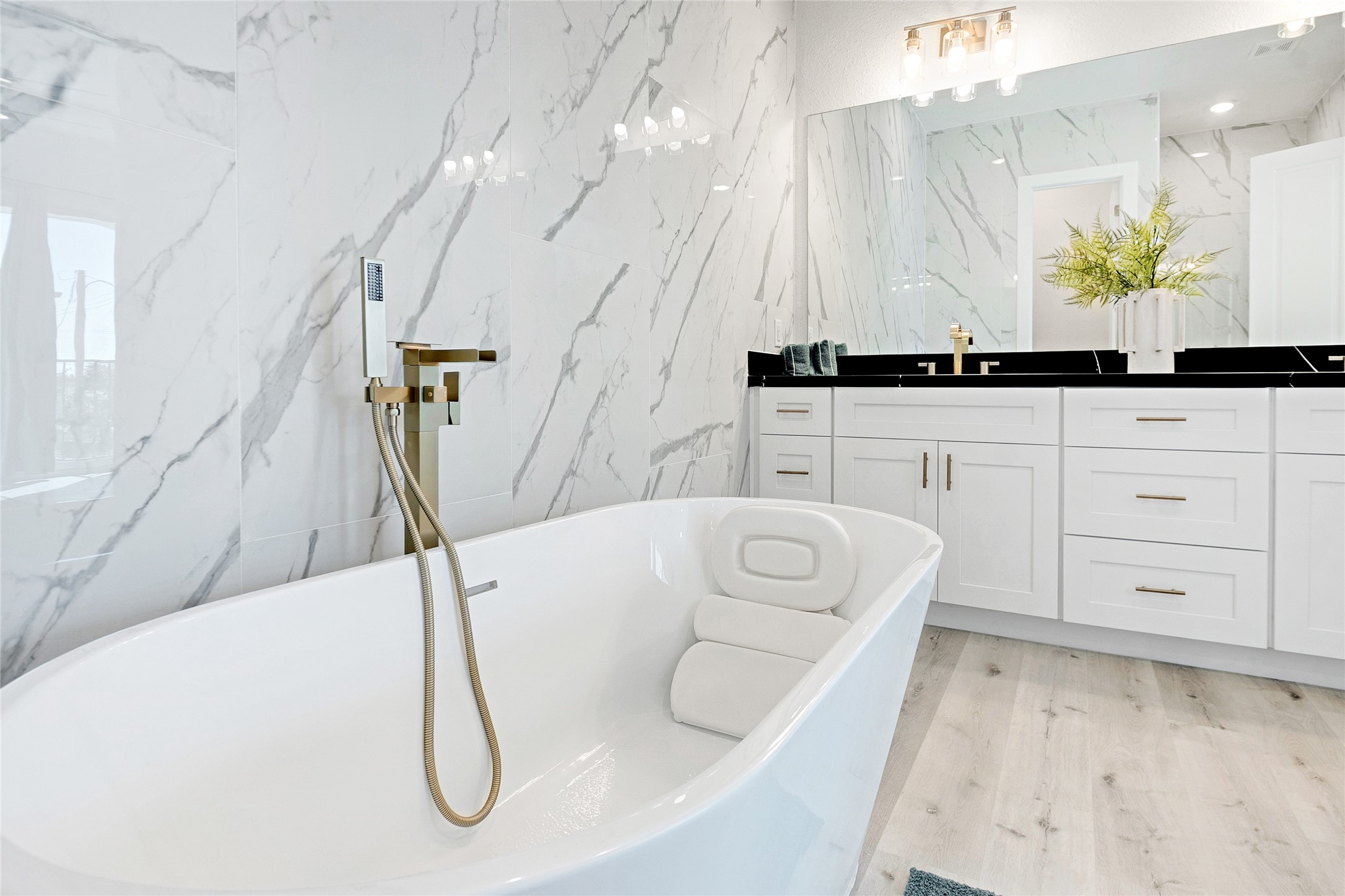 5908 St Augustine Street, Unit C Houston, TX 77021 - Photo 7 of 33 a spacious bathroom with a double vanity sink and a mirror