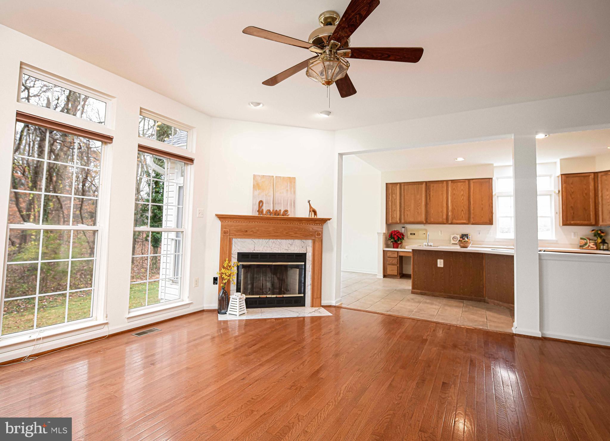 2015 Singer Road Joppa, MD 21085 - Photo 12 of 57 Family Room with wood burning fireplace