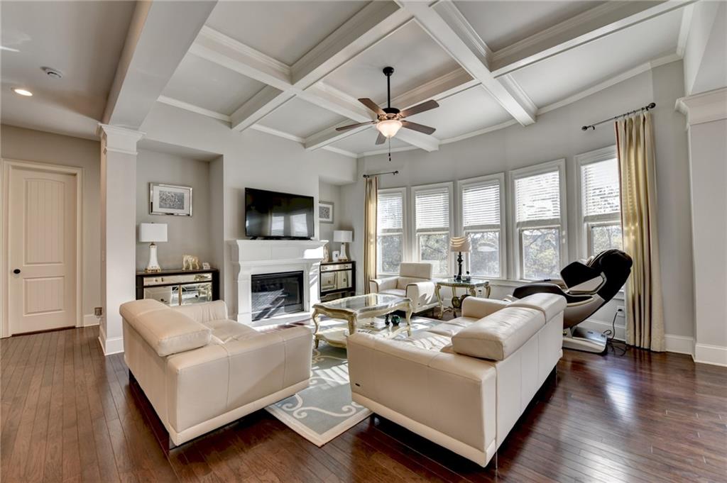5930 Caveat Court Suwanee, GA 30024 - Photo 16 of 98 a living room with furniture fireplace and a flat screen tv